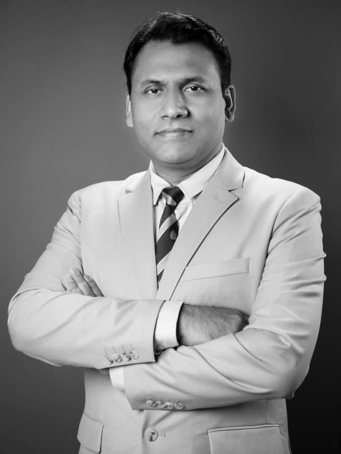 Professional portrait of Shahzad Nazir